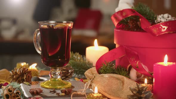 Hot Wine in Glass Mugs Gluhwein and Cinnamon Closeup