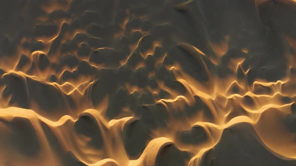  Aerial Abstract Background with Beautiful Wavy Sand Dunes in Golden Sunset