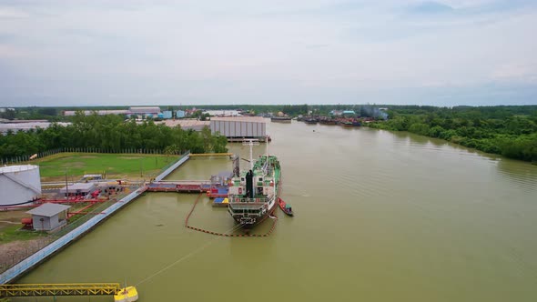 Aerial top view of cargo ship carrying container.Container ship loading and unloading in deep sea