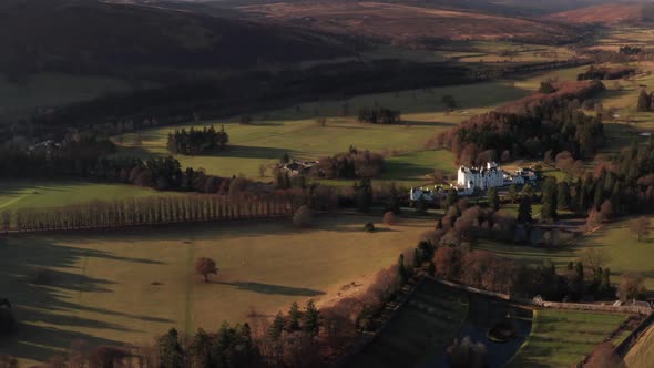 The White Castle Of Blair Atholl In The Core Of The Cairngorms National Park In Scotland. -aerial sh