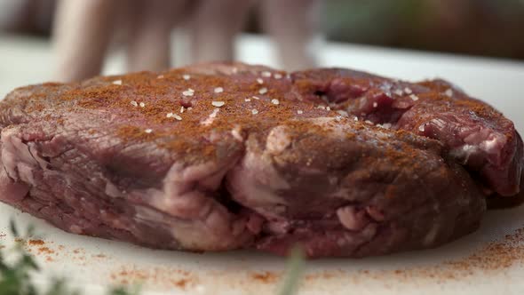 Raw Steak with Spices.