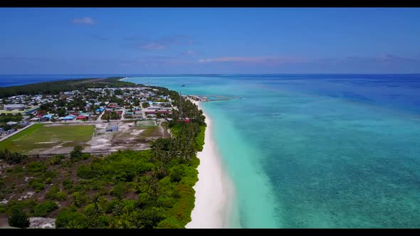 Aerial drone view texture of perfect coast beach wildlife by blue ocean with white sandy background 