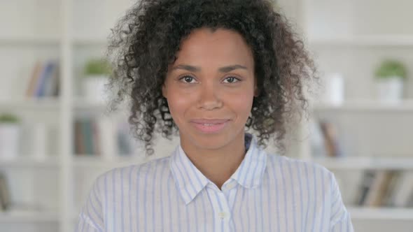 African Woman Saying Yes By Shaking Head