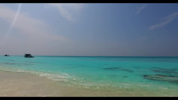 Aerial top view nature of relaxing resort beach holiday by aqua blue ocean with white sandy backgrou