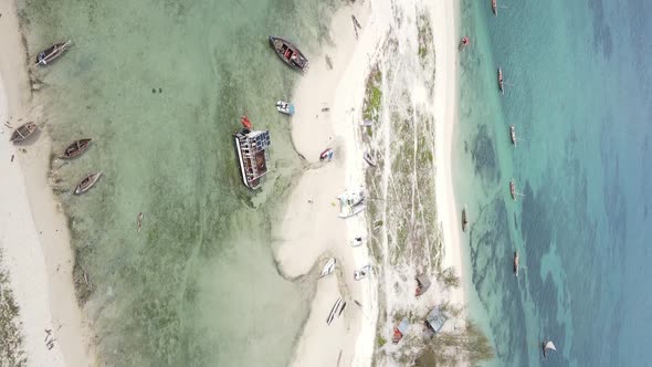 Tanzania Vertical Video  Boat Boats in the Ocean Near the Coast of Zanzibar Aerial View