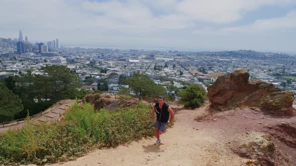 Asian Man Trail Running In San Francisco
