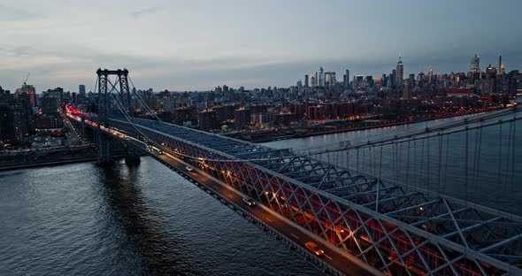 Williamsburg Bridge Across East River with East Village and New York City Skyscraper