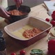 Woman Is Putting Hot Sauce In Ovenware - VideoHive Item for Sale