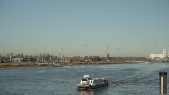 River cruise with wind turbines sustainable energy