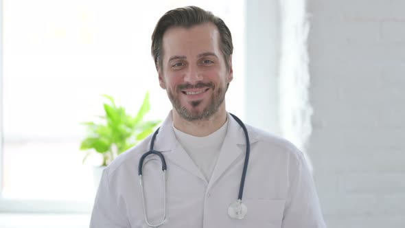 Portrait of Young Doctor Smiling at Camera