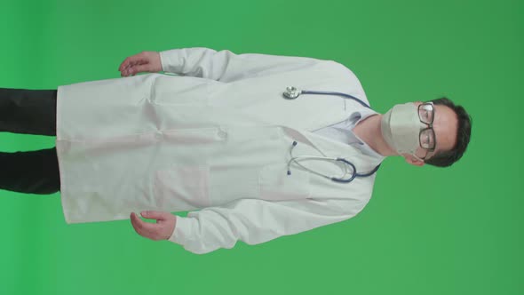 Asian Doctor With Stethoscope Wearing Mask, Walking On Green Screen Chroma Key