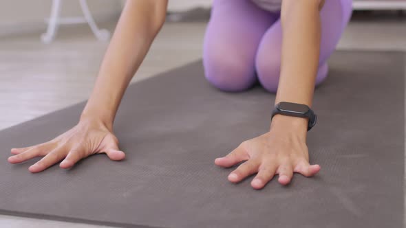 Cloese up.Asian woman working out in sportswear while doing yoga