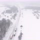 Trucks are Stuck in Traffic on a Snowcovered Highway - VideoHive Item for Sale