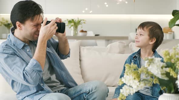 Father Takes Photos of His Son