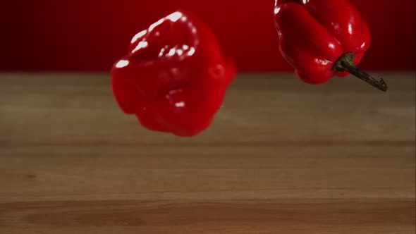Peppers falling bouncing in ultra slow mo 