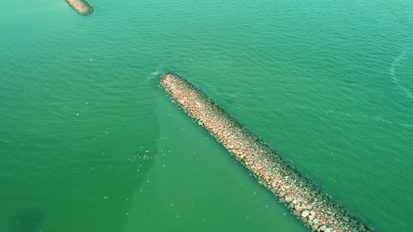 4K Aerial view of drone move on beautiful sea. Flight over ocean, open sea. Dynamic aerial shot.