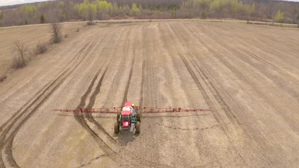 crop dusting tractor rolls to a stop
