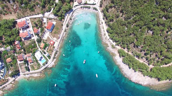 Aerial view of people swimming in turquoise bay on the island of Brac, Croatia