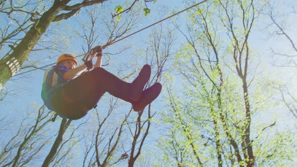 Young man on a zip-line