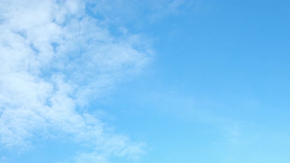 4K Time lapse of beautiful blue sky with clouds background, Blue sky with clouds and sun.