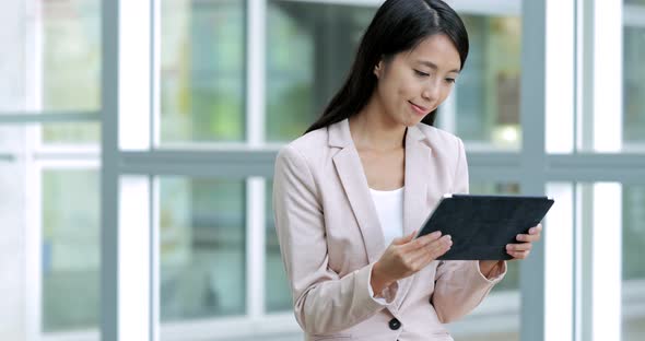 Business woman working on tablet computer 