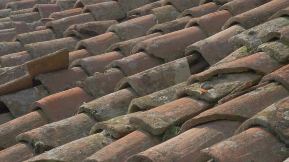 Old clay roof top materials 4K 2160p UHD footage - Panning over ancient roof top 4K 3840X2160 UHD vi