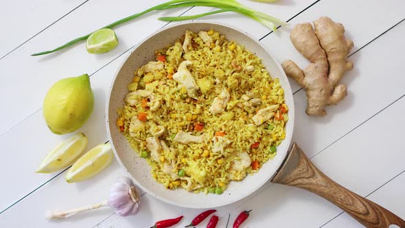 Delicious Fried Rice with Chicken and Vegetables Served in Pan