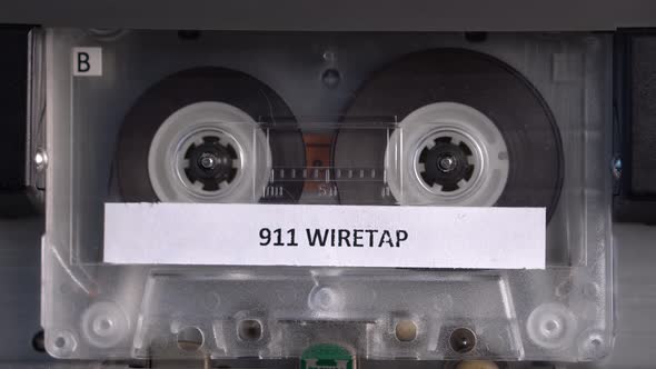 911 Wiretap Audio Recording on Vintage Cassette Tape Playing in Deck Player