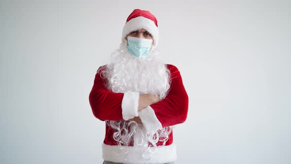 Santa Claus in Medical Mask Looks Camera