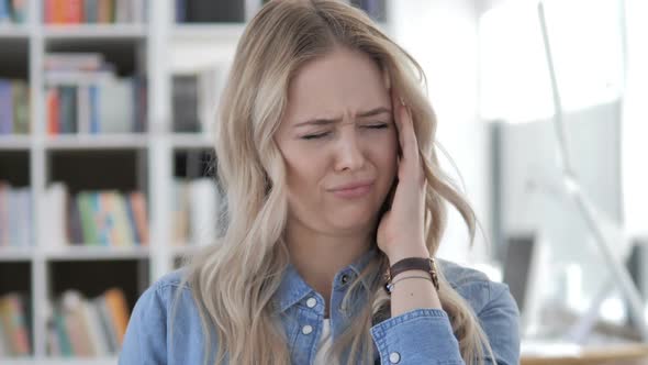 Headache Young Woman with Head Pain