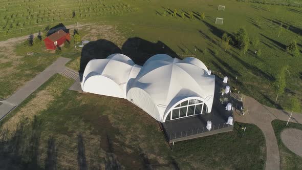 Aerial View of Rural Area View of a White Tent for Recreation and Events a Place of Rest Outside the