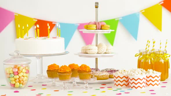 Food and Drinks on Table at Birthday Party