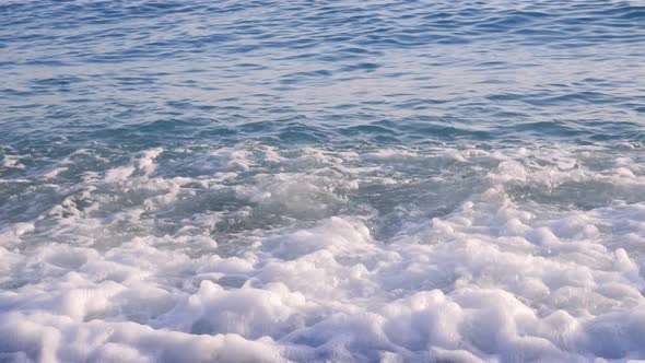 close up shot of waves at beach