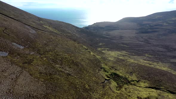 Aerial View of the Beautiful Coast at Malin Beg with Slieve League in the Background in County