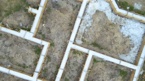 Aerial View of Building Works of New House Concrete Foundation on Construction Site