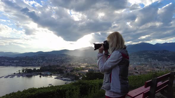 Photographer Woman By Lugano Skyline