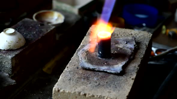 Closeup of Wedding Ring Polishing By Caicasian Jeweler Isolated  Footage