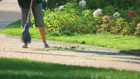 Use Broom To Clean Fallen Leaves.