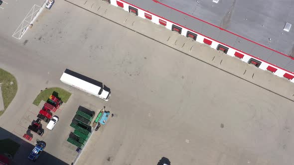 Logistics warehouse with gates for loading. Aerial View