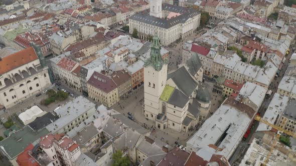 Aerial Drone Video Panorama of Latin Cathedral in City Lviv Ukraine Flight Above Roofs Streets
