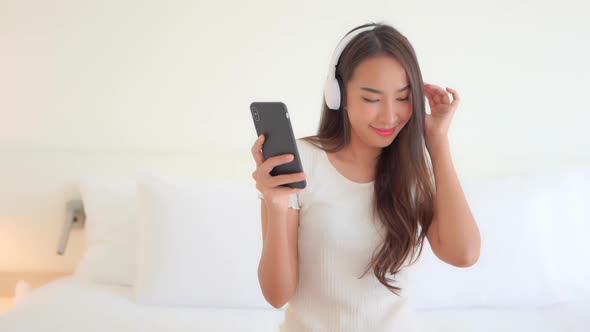 Woman use smart phone for listen music