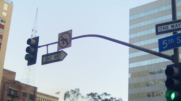 Traffic Lights Road Signs Hanging Over Street