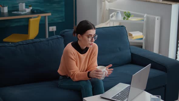 Person Attending Remote Conversation on Video Call Meeting