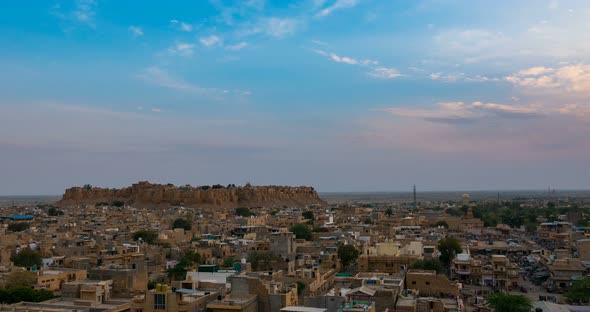 Jaisalmer cityscape, time lapse. The majestic fort dominating the desert city, Rajasthan, India.