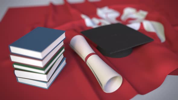 Graduation Cap and Diploma on the Flag of Hong Kong