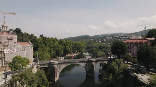 Revealing the Sao Goncalo monastery and the bridge over the Tamega river in Amarante, Portugal