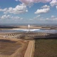 Drone view of Gemasolar Thermosolar Plant in Spain. Solar energy. Green energy. Renewable energy. - VideoHive Item for Sale