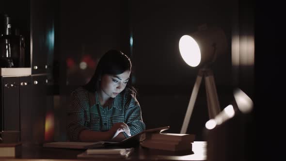 Woman Taking Notes at Office