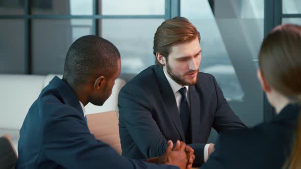 Successful business people at a meeting in the office