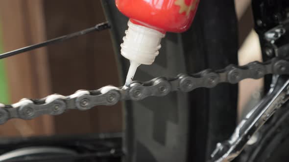 Bicycle chain greasing. Chain lubing